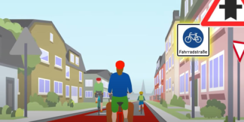 Standbild aus dem animierten Erklärvideo zeigt eine Verkehrssituation mit Radfahrern an einer Kreuzung auf einer Fahrradstraße